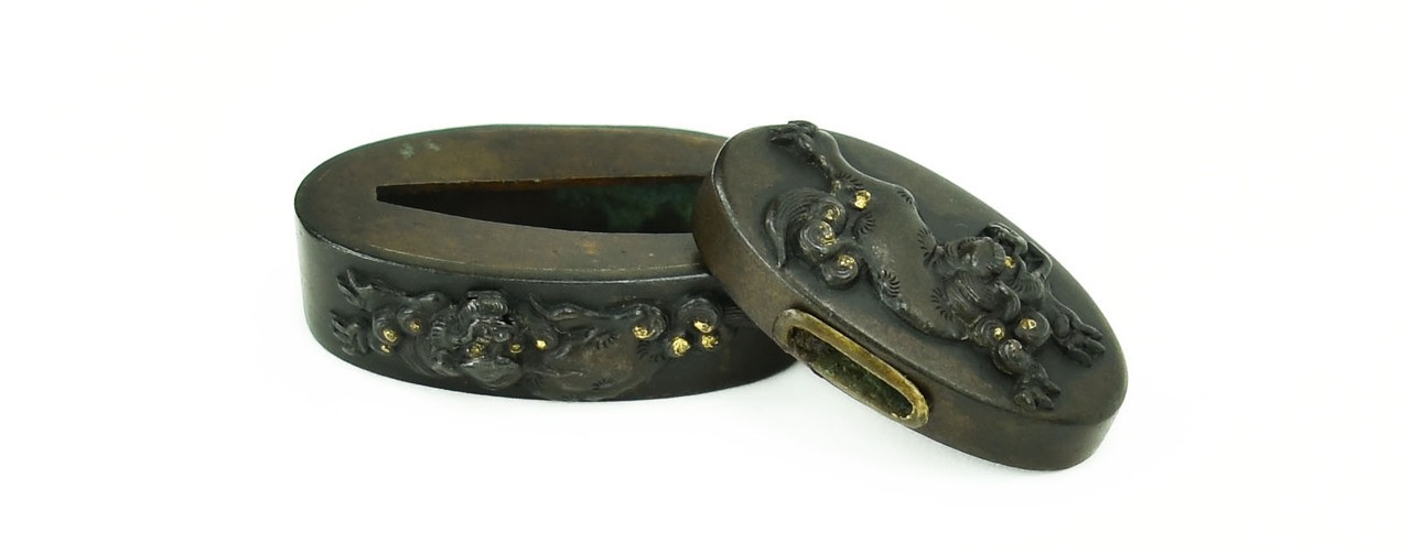 Fuchi Kashira well cut Shishi in Shakudo