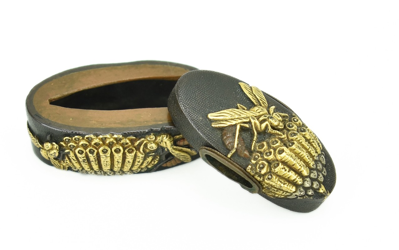 Fuchi Kashira with Wasps tending their nest