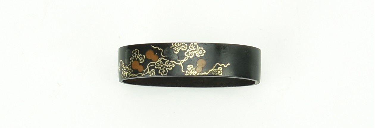 Shakudo Kinko Fuchi Kashira decorated with gourds on a unit with gold, silver, and copper highlights