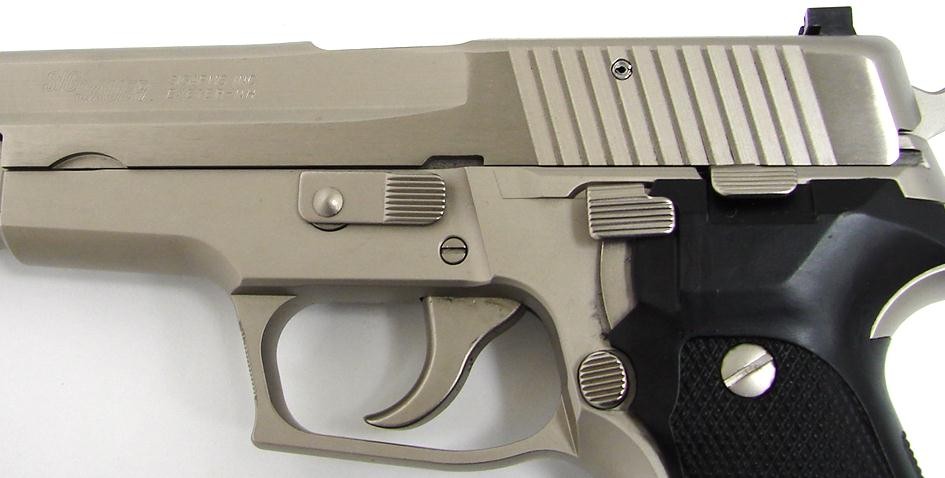 Sig-Sauer P229 9mm Para caliber pistol. Factory satin nickel