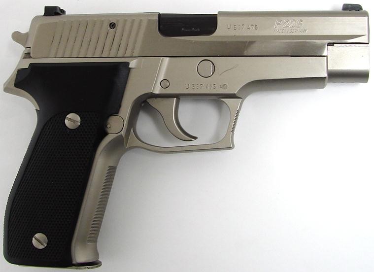 Sig-Sauer P229 9mm Para caliber pistol. Factory satin nickel