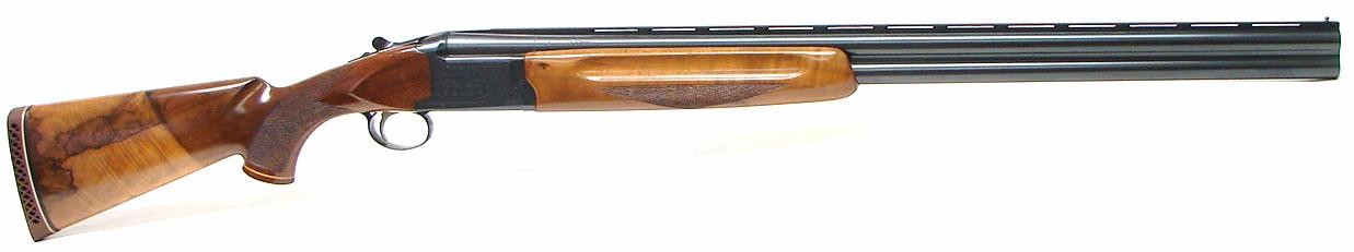 Weatherby Orion 12 GA shotgun. Over/under field gun with 28