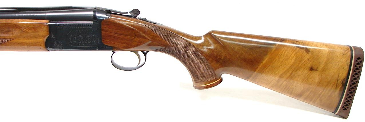 Weatherby Orion 12 GA shotgun. Over/under field gun with 28