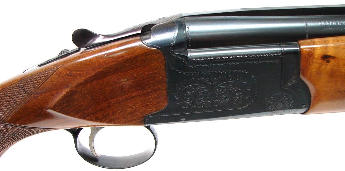 Weatherby Orion 12 GA shotgun. Over/under field gun with 28