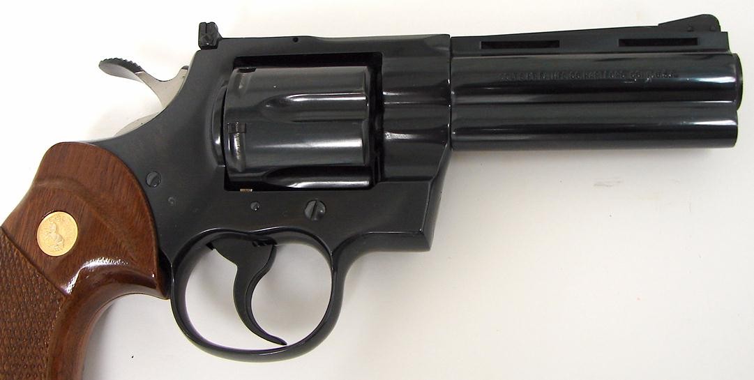 Colt Python .357 Mag caliber revolver. 4” blue model in excellent ...