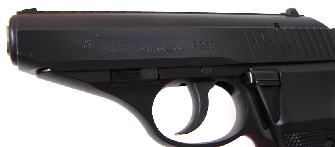 Sig Sauer P230 .380 ACP caliber pistol. Compact automatic with blue ...