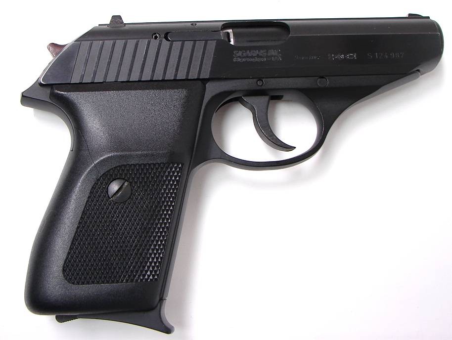 Sig Sauer P230 .380 ACP caliber pistol. Compact automatic with blue ...