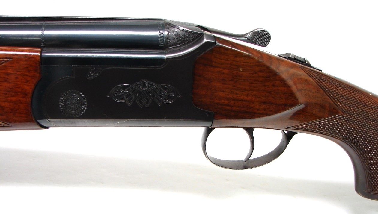 Savage 440B 12 gauge shotgun. Over/under field gun with 26