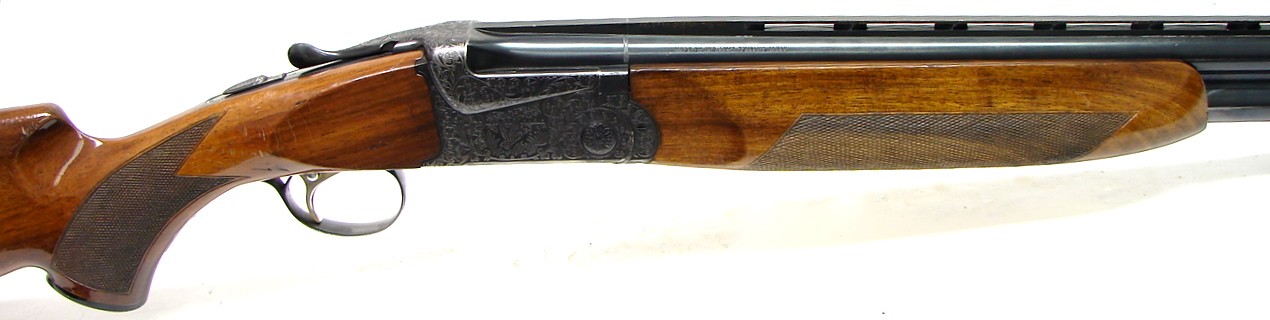 SKB Arms Company 500 12 gauge shotgun. Over/under field gun with 26 ...