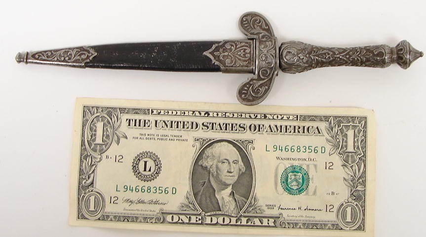 Spanish dagger with deep chiseled mounts. (K751)