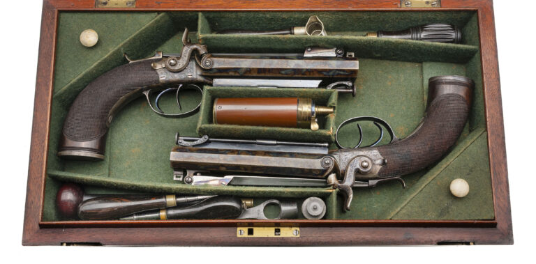Excellent Cased Identified Pair of Double Barrel Percussion Pistol With Flip Bayonets